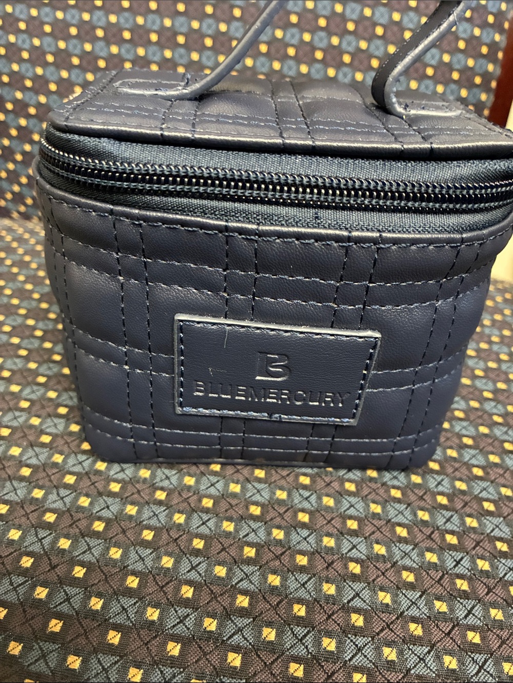 Women’s Quilted Navy Cosmetic Case with Top Handle